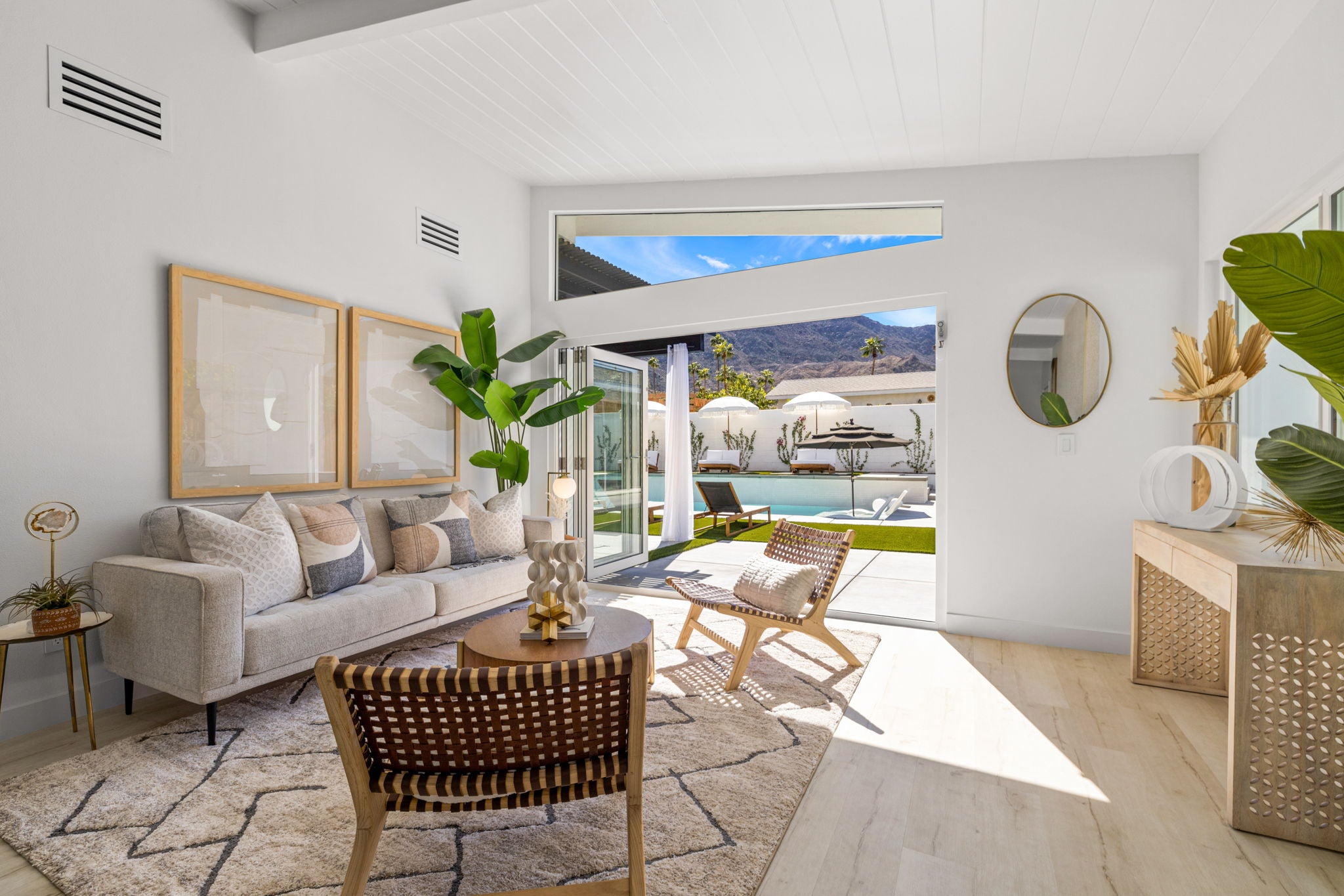 Simply Staging - Staged Living Room - Couch, Two Chairs, coffee table, console table, accessories