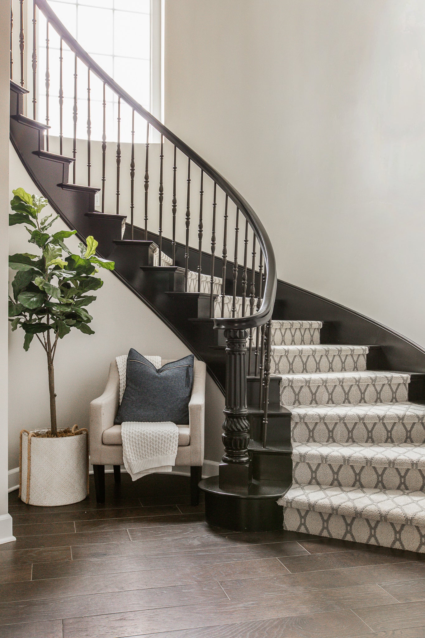 Professional photography makes all the difference in your listing.  Make it stand out from the rest with professional photography by simply staging - image with sitting are and stairs 
