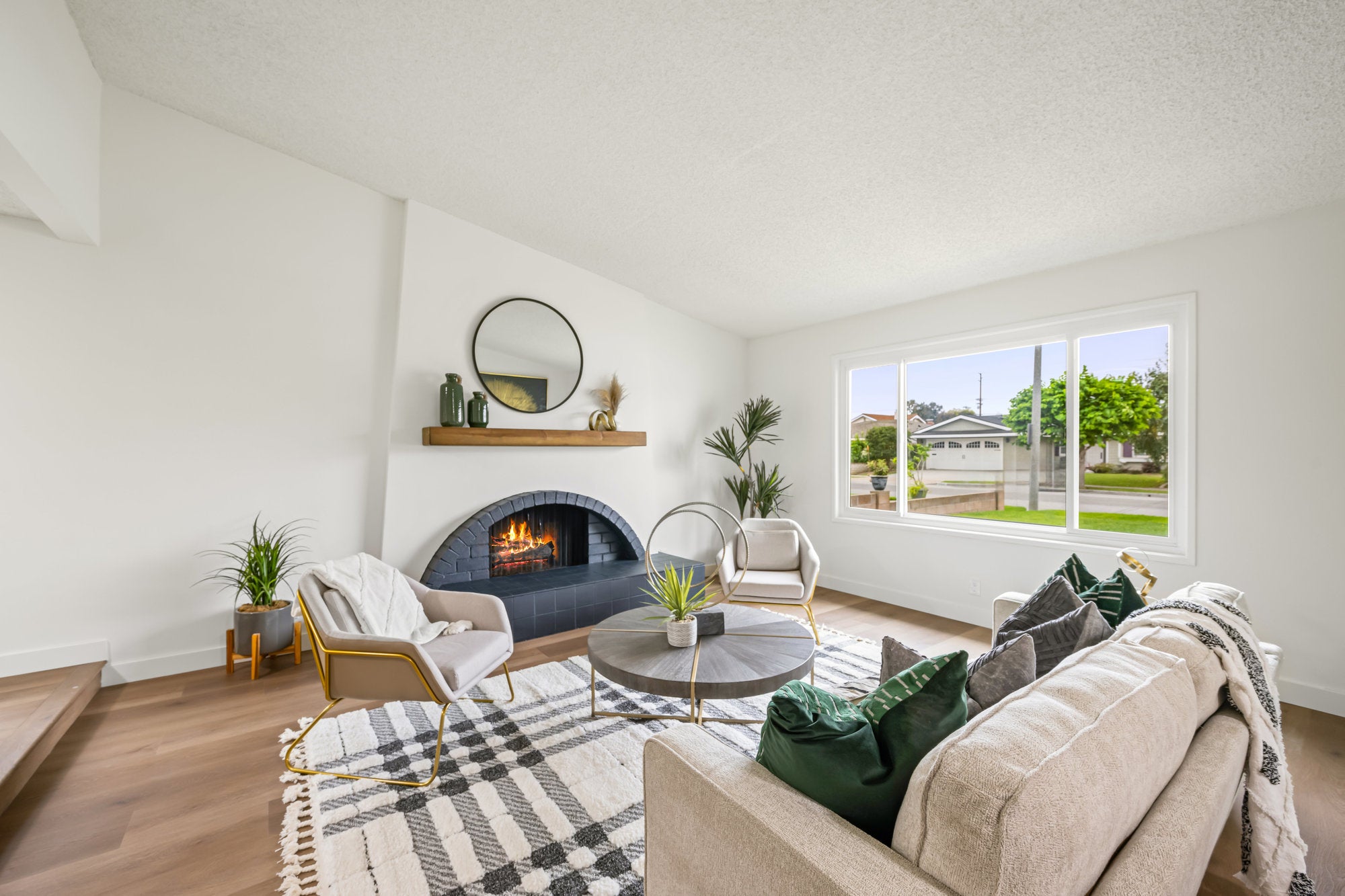 Simply Staging - Living Room - Couche, Chairs, Coffee Table, Fireplace Decor