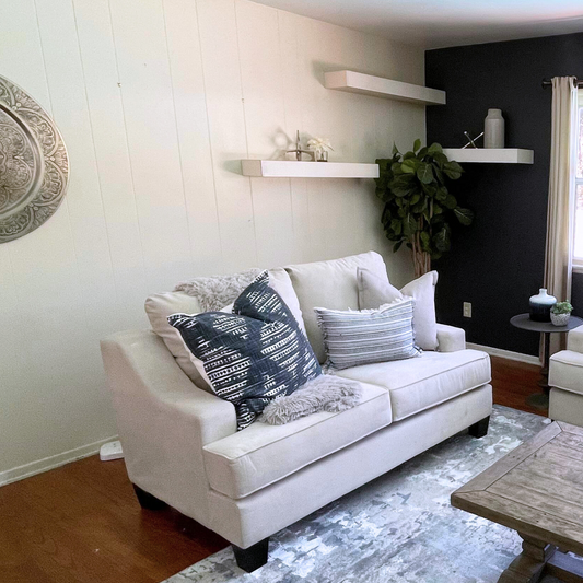 Cream Velvet Sofa in a staged living room