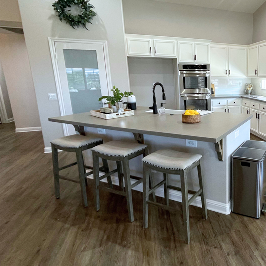 Cushion Nailhead Barstool  in staged kitchen