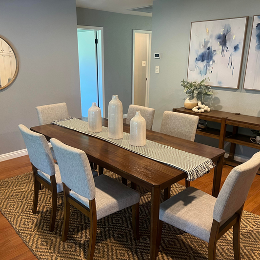 set of 6 grey fabrics dining chairs in a staged room