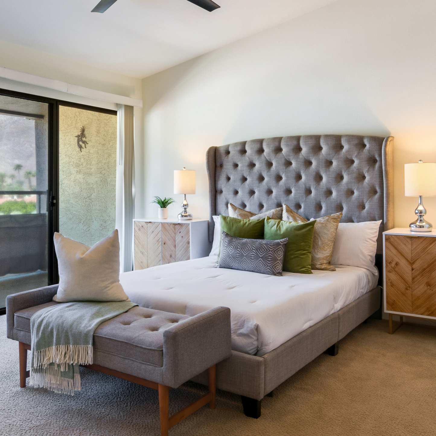 Grey Tufted Queen Bed Frame in a staged bedroom