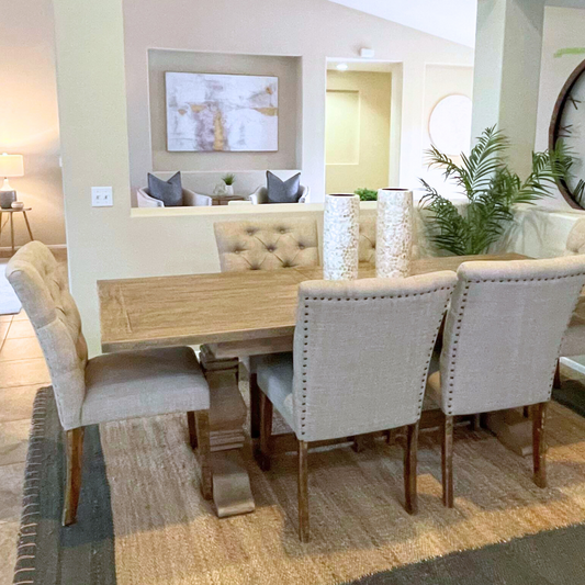 Tufted Dining Chairs in a staged dining room. 