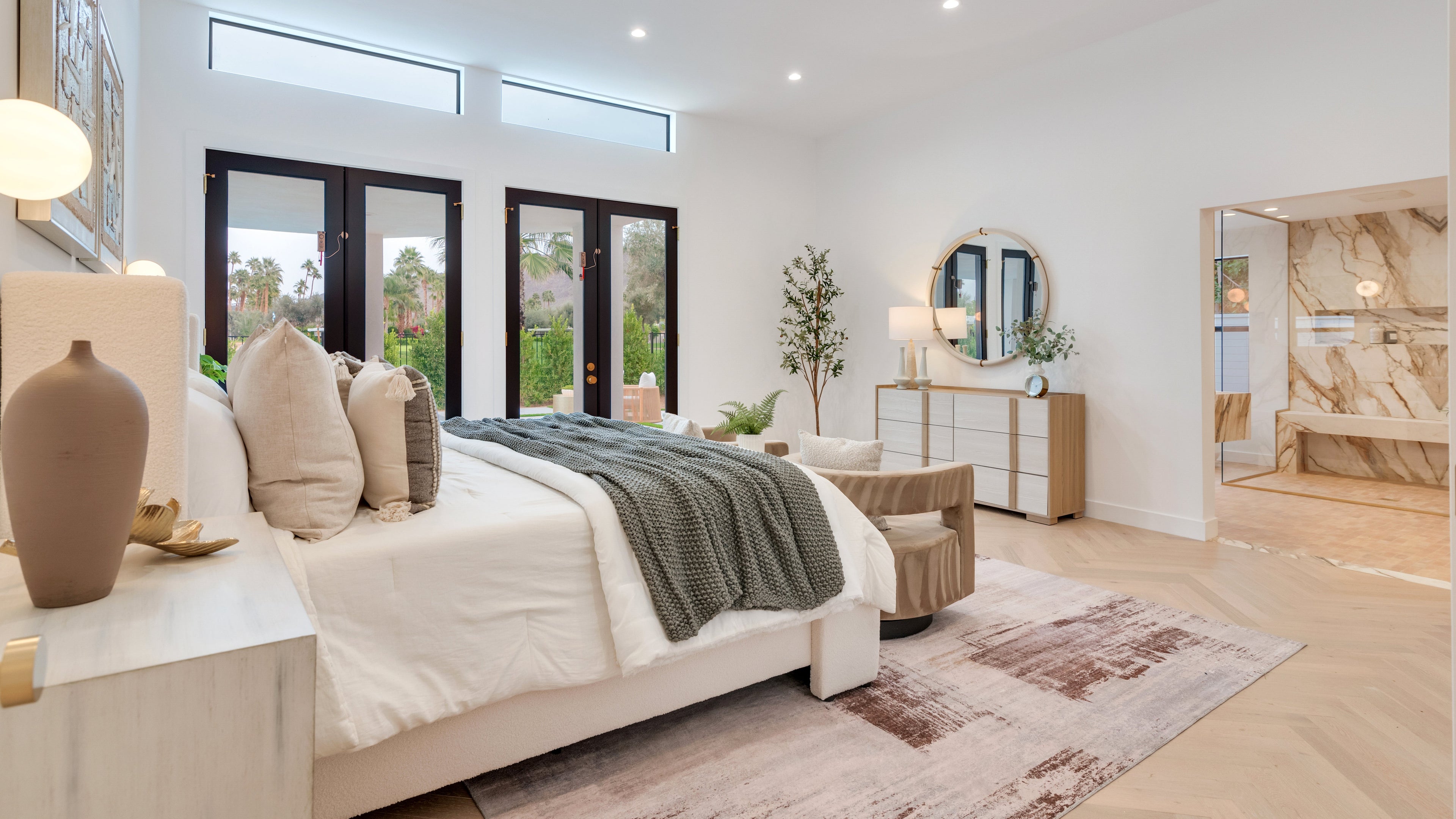 professionally staged modern bedroom - creams, and naturals colors